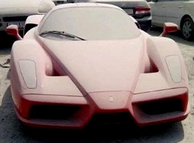 Gathering dust ... £1m Ferrari Enzo abandoned in Dubai